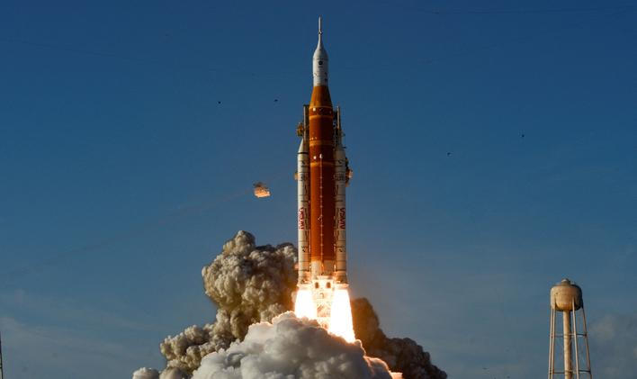 NASA's Artemis II mission to fly by the moon, comprising of the Space Launch System (SLS) rocket with the Orion crew capsule, lifts off