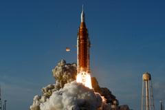 NASA's Artemis II mission to fly by the moon, comprising of the Space Launch System (SLS) rocket with the Orion crew capsule, lifts off