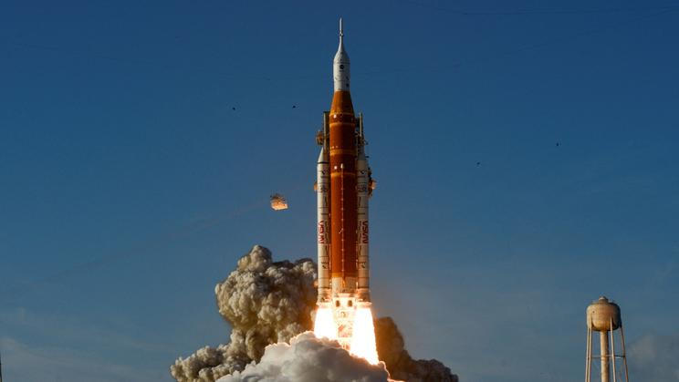 NASA's Artemis II mission to fly by the moon, comprising of the Space Launch System (SLS) rocket with the Orion crew capsule, lifts off