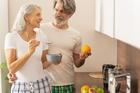 Lady,With,A,Spoon,Of,Porridge,Smiling,At,Her,Husband