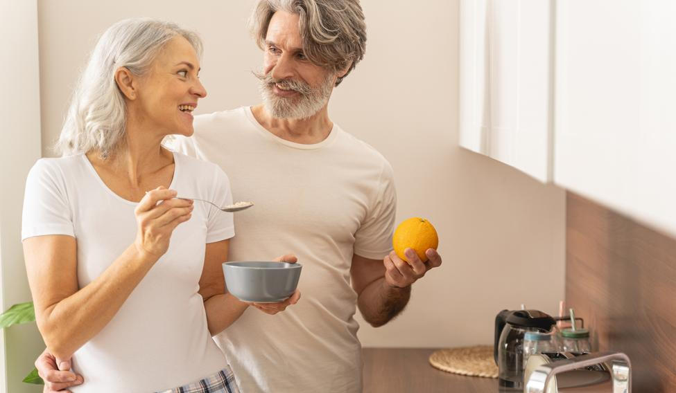 Lady,With,A,Spoon,Of,Porridge,Smiling,At,Her,Husband