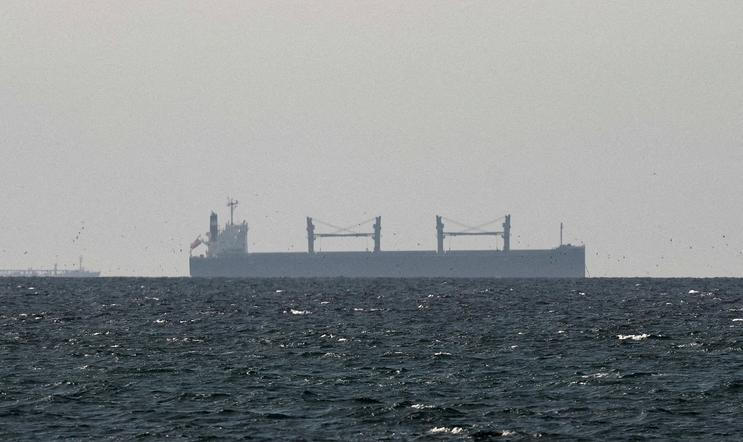 FILE PHOTO: FILE PHOTO: A cargo ship in the Gulf, near the Strait of Hormuz