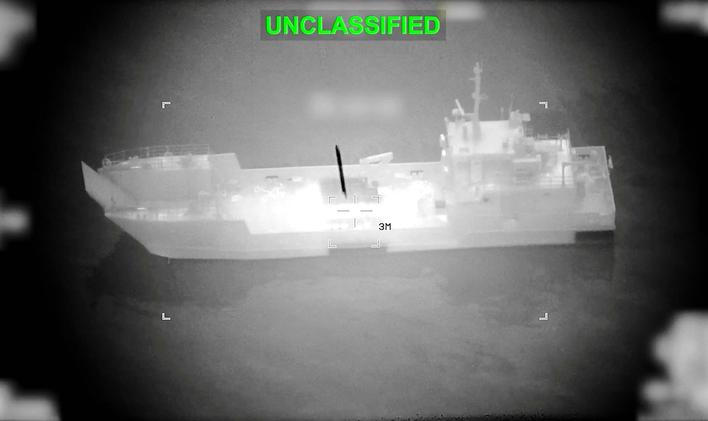 A projectile approaches what U.S. Central Command (CENTCOM) says is an Iranian naval vessel, during strikes that included attacks on mine-laying vessels, at a location given as near the Strait of Hormuz