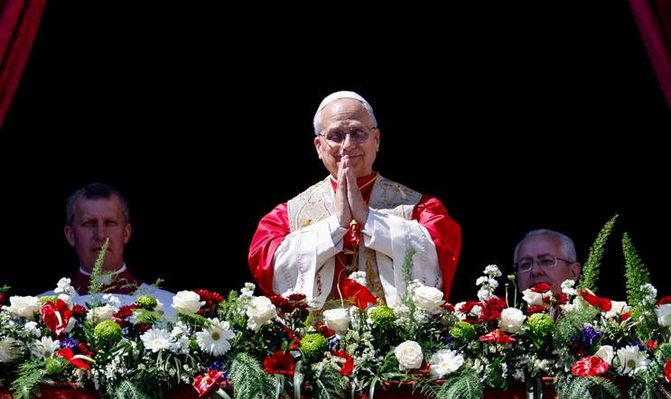 Pope Leo XIV delivers his "Urbi et Orbi" (To the city and the world) message from the main balcony of St. Peter's Basilica