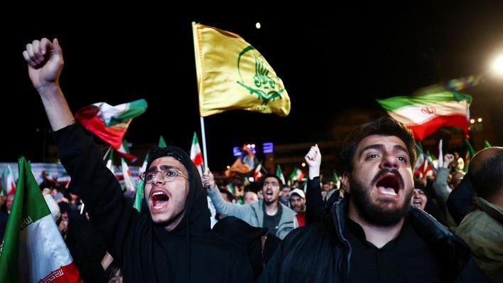 People gather after a two-week ceasefire in the Iran war was announced, in Tehran