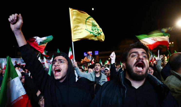 People gather after a two-week ceasefire in the Iran war was announced, in Tehran