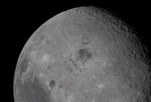 The Moon, with its Orienale basin prominent at center, is photographed by the Artemis II crew