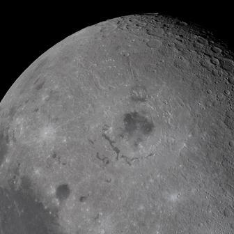 The Moon, with its Orienale basin prominent at center, is photographed by the Artemis II crew