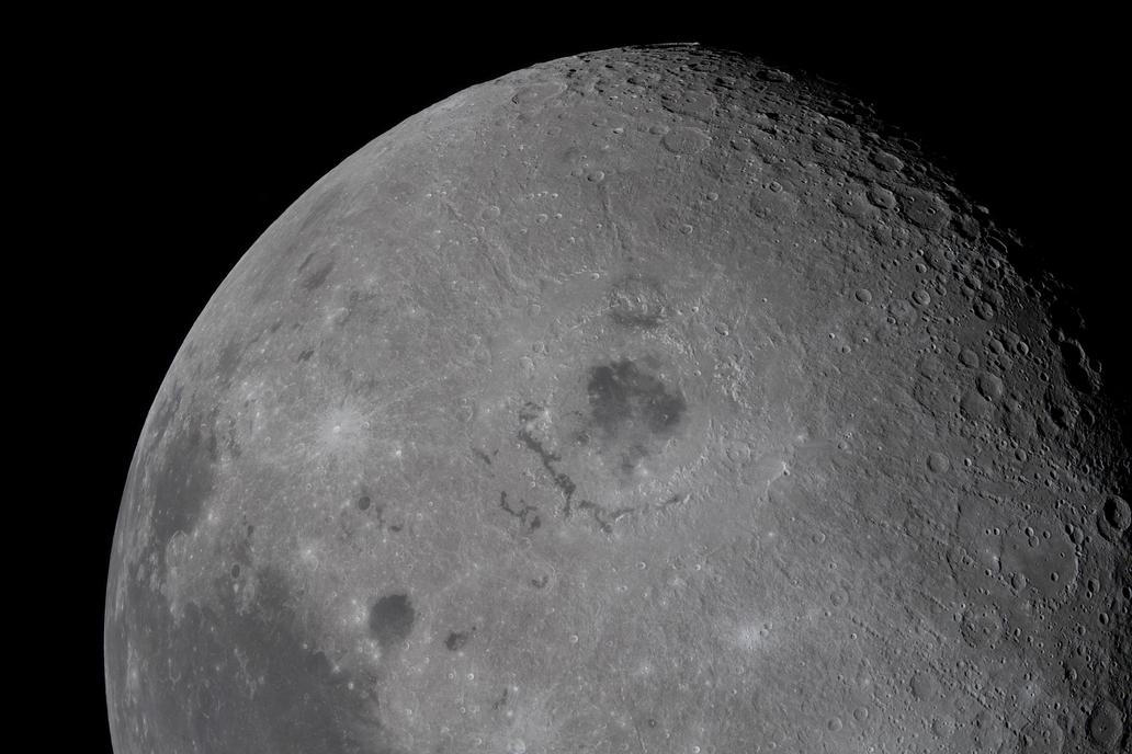 The Moon, with its Orienale basin prominent at center, is photographed by the Artemis II crew