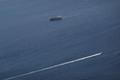 Boats in the Strait of Hormuz amid the U.S.-Israeli conflict with Iran, as seen from Musandam