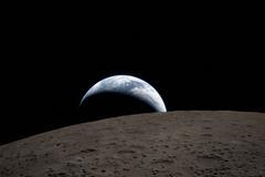 FILE PHOTO: A view of Earth, partially hidden behind the Moon, captured through the Orion spacecraft window