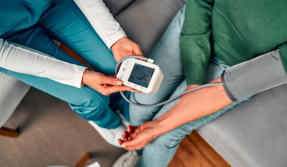 Cropped,Image,Top,View,Of,Doctor,Measuring,Blood,Pressure,Of