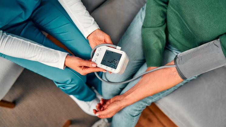 Cropped,Image,Top,View,Of,Doctor,Measuring,Blood,Pressure,Of
