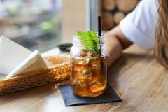 Refreshing,Iced,Tea,In,Glass,Jar,With,Mint,Leaves,And