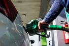 Man,Driver,Hand,Refilling,And,Pumping,Gasoline,Oil,The,Car