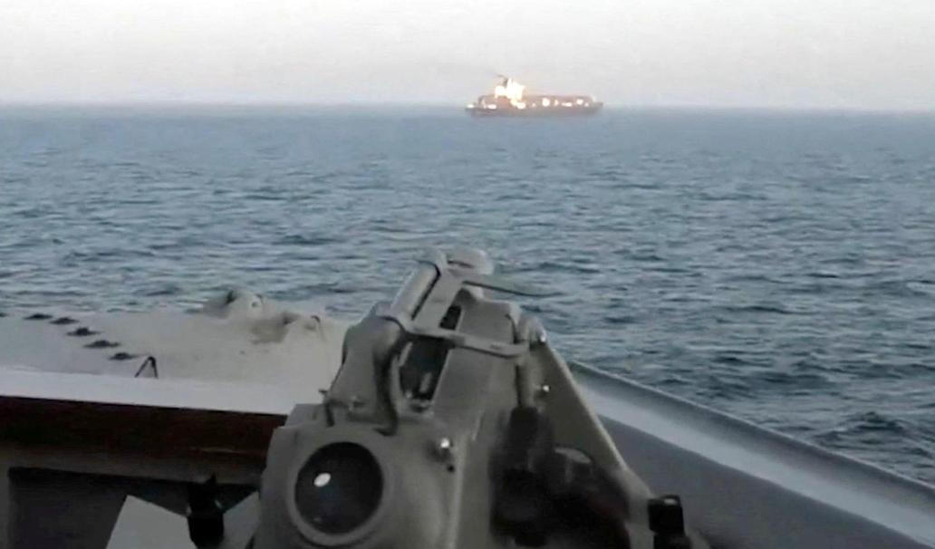 A view of Iranian-flagged cargo ship Touska as USS Spruance (DDG 111) conduts its interception in a location given as the north Arabian Sea