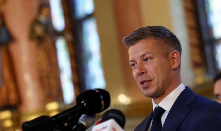 Hungary's election winner Magyar talks to the media after talks between parties on preparations for the first session of the Parliament in Budapest