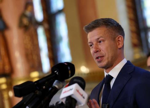 Hungary's election winner Magyar talks to the media after talks between parties on preparations for the first session of the Parliament in Budapest