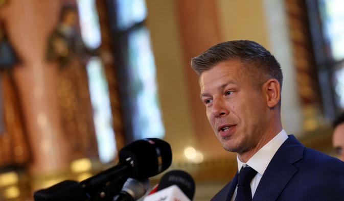 Hungary's election winner Magyar talks to the media after talks between parties on preparations for the first session of the Parliament in Budapest