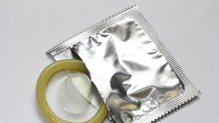 Condom,Packaging,On,A,White,Background,,Condom,In,Foil,Packaging,