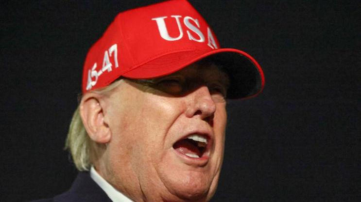 U.S. President Donald Trump disembarks Air Force One as he arrives at Joint Base Andrews in Maryland