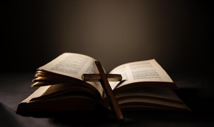 Spirituality,,Religion,And,Hope,Concept.,Holy,Bible,And,Cross,On