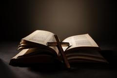 Spirituality,,Religion,And,Hope,Concept.,Holy,Bible,And,Cross,On