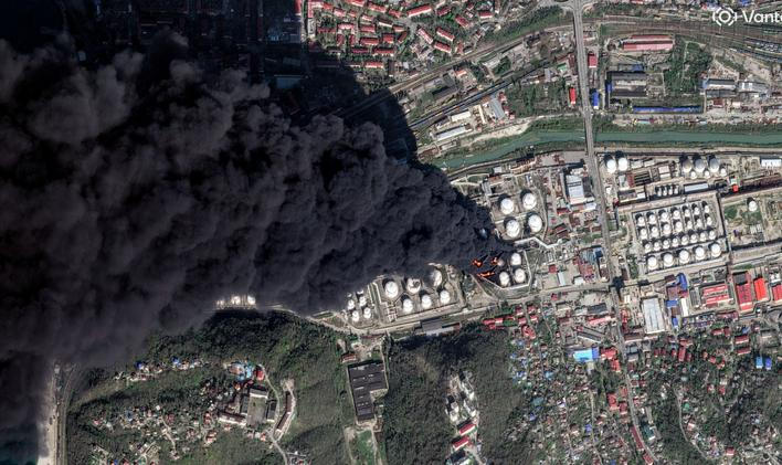 A satellite image shows smoke billowing, following drone attacks on a Russian oil facility in the Black Sea port of Tuapse