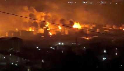 FILE PHOTO: Fire and smoke rise at Tuapse oil refinery near Tuapse port