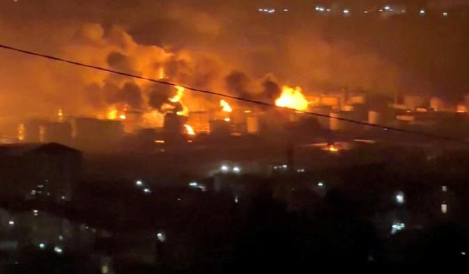 FILE PHOTO: Fire and smoke rise at Tuapse oil refinery near Tuapse port