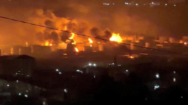 FILE PHOTO: Fire and smoke rise at Tuapse oil refinery near Tuapse port