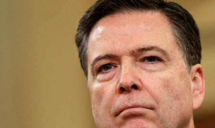FILE PHOTO: FBI Director James Comey at House Intelligence Committee hearing in Washington
