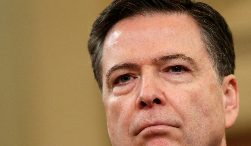 FILE PHOTO: FBI Director James Comey at House Intelligence Committee hearing in Washington