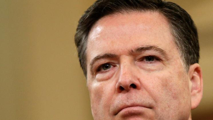 FILE PHOTO: FBI Director James Comey at House Intelligence Committee hearing in Washington