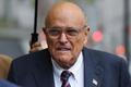 FILE PHOTO: Former Trump lawyer and former New York City Mayor Giuliani arrives at U.S. Federal court, in New York