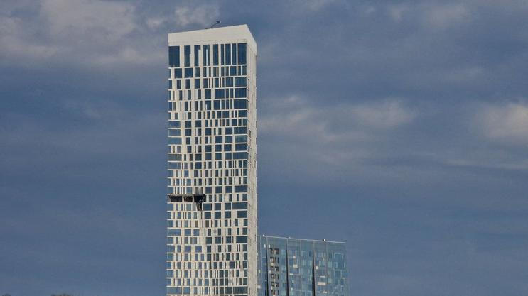 The damaged facade of a high-rise building following a drone attack, amid the Russia-Ukraine conflict, in Moscow