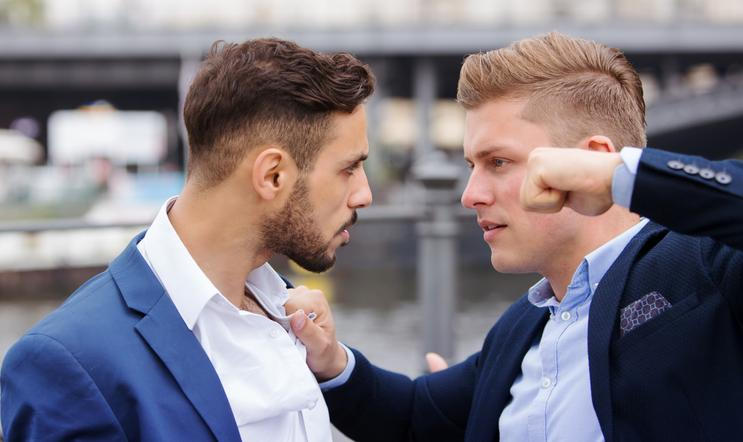 Two,Young,Businessmen,Having,A,Fight,Outside