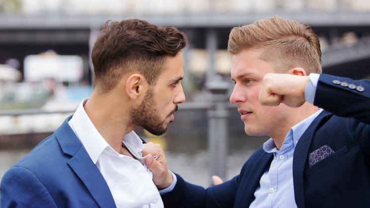 Two,Young,Businessmen,Having,A,Fight,Outside