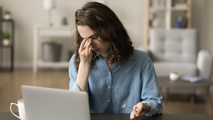 Tired,Frustrated,Freelance,Employee,Girl,Working,At,Laptop,,Taking,Eyeglasses