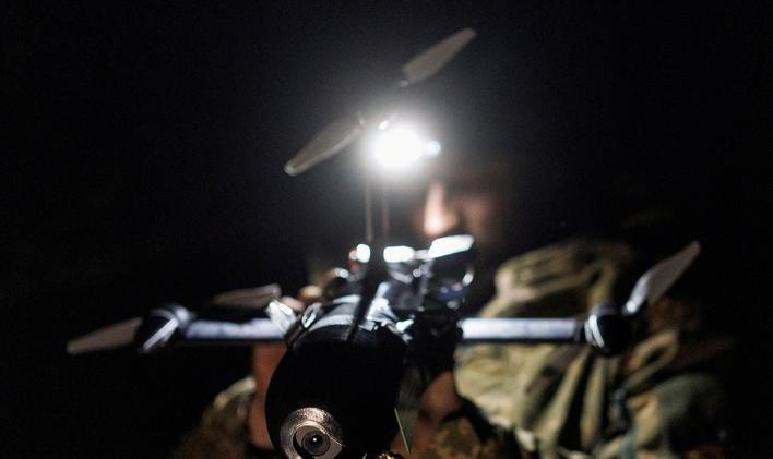 FILE PHOTO: Ukrainian serviceman prepares for a fly an FPV interceptor drone during his combat shift in Kharkiv region