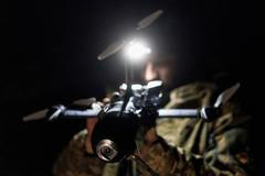 FILE PHOTO: Ukrainian serviceman prepares for a fly an FPV interceptor drone during his combat shift in Kharkiv region