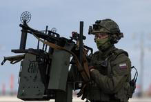 Security personnel patrol an area before a military parade in Moscow