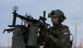Security personnel patrol an area before a military parade in Moscow