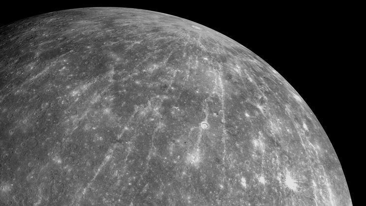 A mosaic of images by NASA's Messenger spacecraft shows an impact crater on the surface of Mercury, named Hokusai