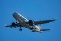 FILE PHOTO: A Frontier Airlines plane approaches Ronald Reagan Washington National Airport