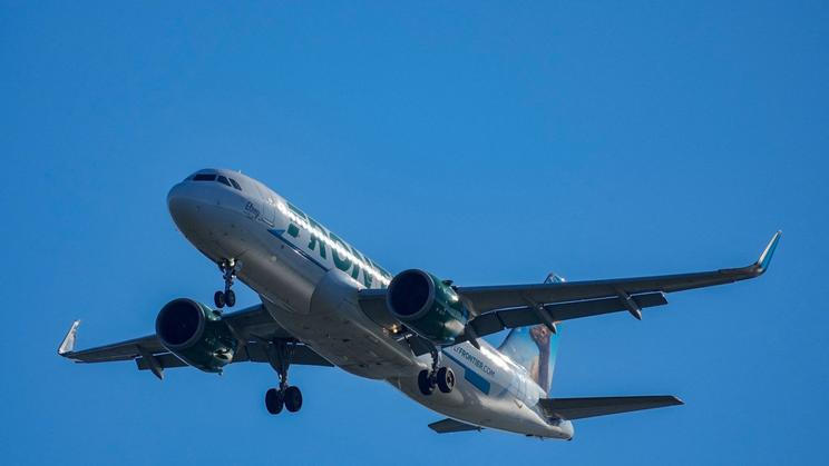 FILE PHOTO: A Frontier Airlines plane approaches Ronald Reagan Washington National Airport