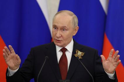 Russian President Vladimir Putin holds a press conference in Moscow