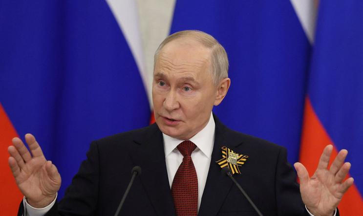 Russian President Vladimir Putin holds a press conference in Moscow