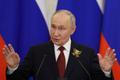 Russian President Vladimir Putin holds a press conference in Moscow