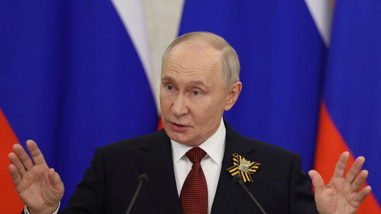 Russian President Vladimir Putin holds a press conference in Moscow